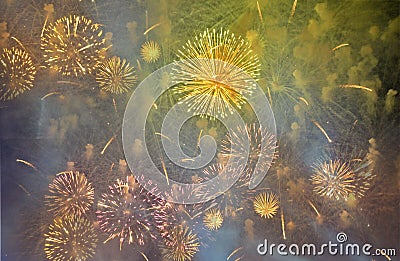 Fireworks in the dark night sky Stock Photo