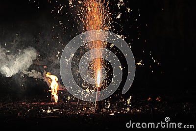 Fireworks or firecrackers during Diwali or Christmas festival Stock Photo