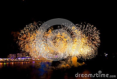 Fireworks in front of the Dubai Wheel overlooking the Persian Gulf on New Year's Eve Editorial Stock Photo