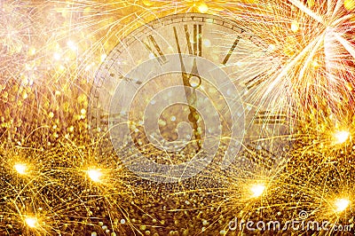 Fireworks New Year Clock.Countdown New Year`s clock.Clock that marks a few minutes to the new year with torches and fireworks Stock Photo