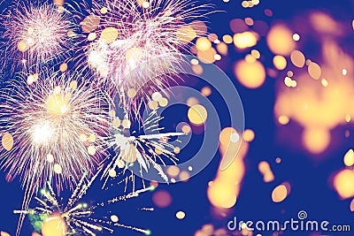 Fireworks at New Year and copy space abstract holiday background. Brightly Colorful Fireworks on twilight background with free Stock Photo