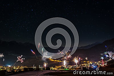 Fireworks on New Years Eve in the Austrian mountains Stock Photo