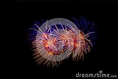 Fireworks in the night.New Year celebration fireworks,Colorful fireworks over dark sky, displayed during a celebration event Stock Photo