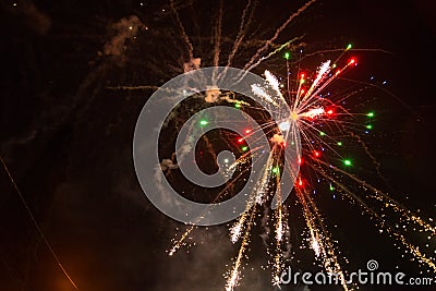 Fireworks the night sky. Photo of fireworks in the sky. A beautiful plume of smoke. Abstract texture of the salute Stock Photo