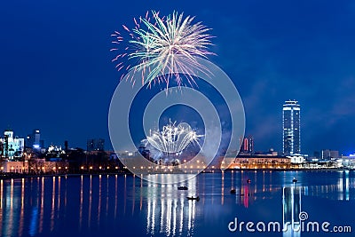 Fireworks over night city Stock Photo