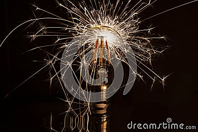 Fireworks sparkler showing through LED light bulb Stock Photo