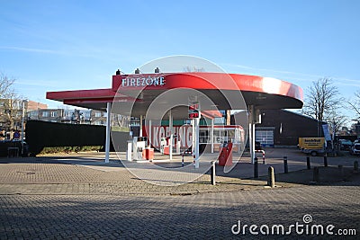 Firezone petrol gas station firestone in the city of Gouda in the Netherlands. Editorial Stock Photo