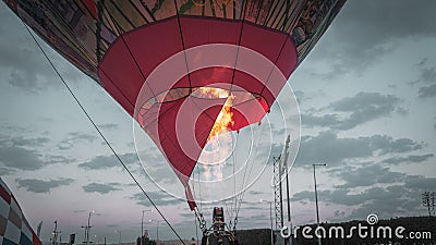 Firing in a balloon Preparation for takeoff Editorial Stock Photo