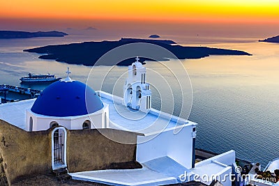 Firostefani, Santorini, Greece. Twilight with old greek church a Stock Photo