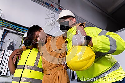 First Aid Factory Team, Support allows patient, Life-saving and rescue methods. Accident at work of electrician job or Maintenance Stock Photo