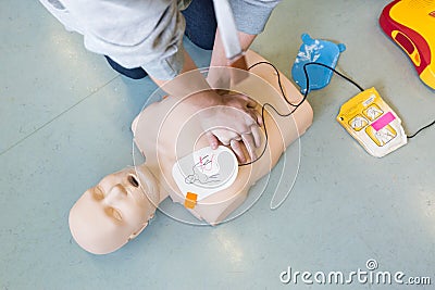 First aid resuscitation course using AED. Stock Photo
