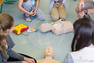 First aid resuscitation course using AED. Editorial Stock Photo