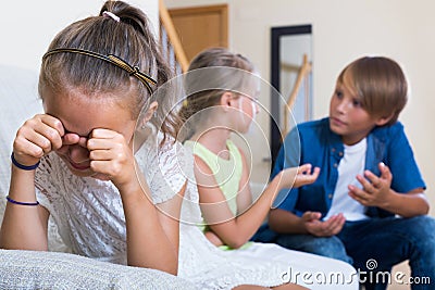 First amorousness: girl and couple of kids apart Stock Photo