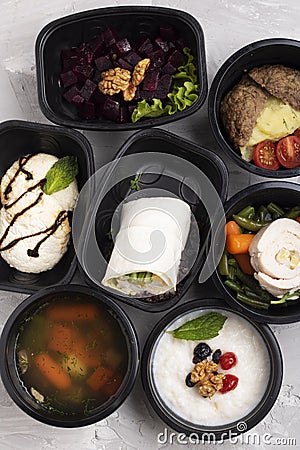 First course - pickle soup with vegetables in food containers Stock Photo