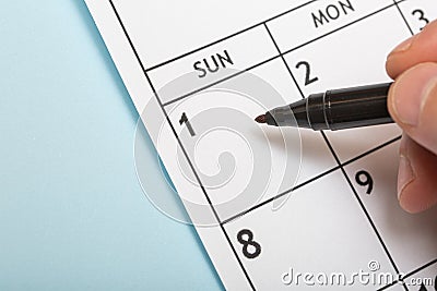 First day on paper calendar close-up. Stock Photo
