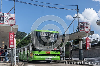 First electric single deck bus in Hong Kong agaisnt blue sky 14B Editorial Stock Photo