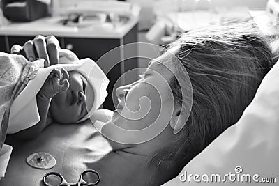 The first moments of mother and newborn after childbirth Stock Photo