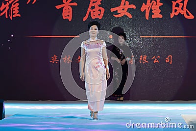 Pink peach blossom-Female cheongsam show Editorial Stock Photo