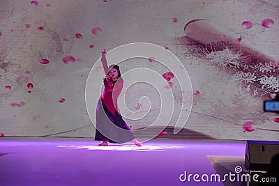 Peach Blossom Dance-Female cheongsam show Editorial Stock Photo