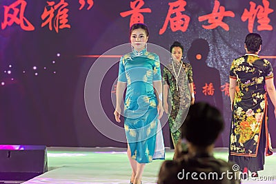 Blue silk-Female cheongsam show Editorial Stock Photo