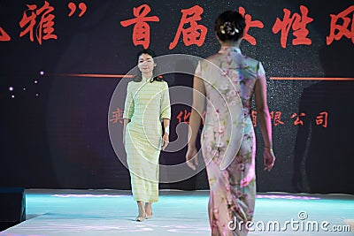 Simple but elegant-Female cheongsam show Editorial Stock Photo