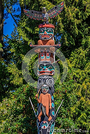First Nations American Indian totem poles in Stanley Park in Van Editorial Stock Photo
