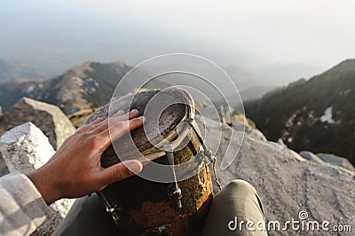 First person view on drums playing hand in the Triund peak mountain in Himalayas Stock Photo
