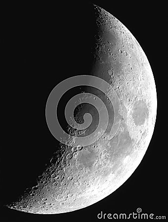 First Quarter Moon Against Black Background (High Resolution) Stock Photo