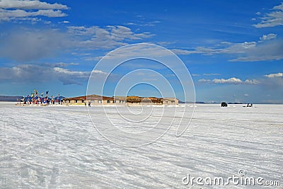 The First Salt HotelNow is a Museum of Uyuni Salt Flats with the Flags of Many Countries Around the World, Bolivia Stock Photo