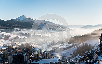 First shadows of setting sun on winter ski resort Carpathians Stock Photo