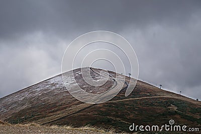 The first snow in the Ukrainian mountains, clouds low mountains Stock Photo