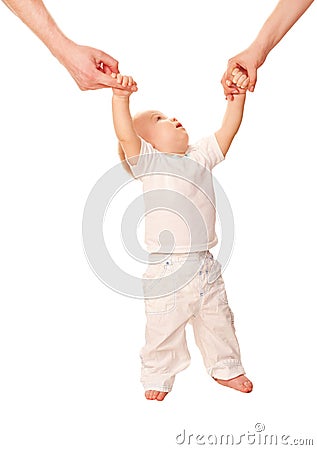 First steps. Baby learning to walk Stock Photo