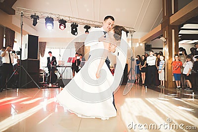 First wedding dance of newlywed couple in restaurant Editorial Stock Photo