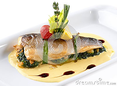 Fish baked and decorated Stock Photo