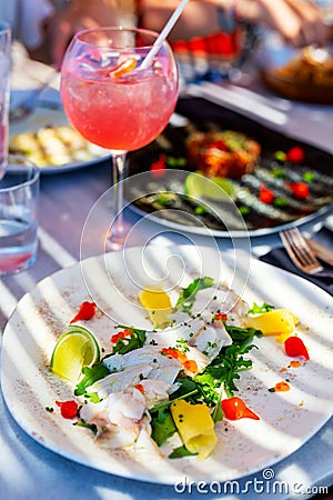 Fish carpaccio served for lunch Stock Photo