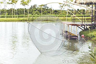 A Fish catch,Fish traps, fishermen using large-sizes square nets called Yo to catch fish. Stock Photo