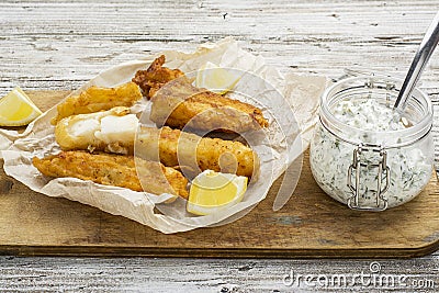 Fish dish - Cod in beer batter with tar tar sauce for a healthy and comfortable diet Stock Photo