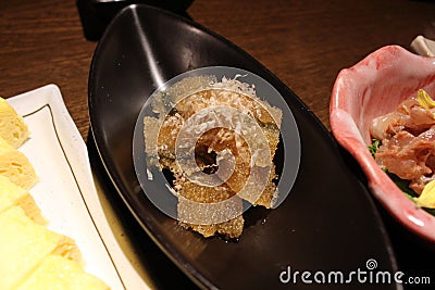 Fish egg, skin, or probably organ served at a izakaya Stock Photo
