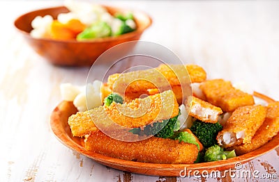 Fish fingers with vegetables side dish Stock Photo