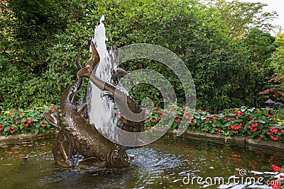 Fish fountain in Japanese Garden, Butchard Gardens, Victoria, Canada Stock Photo