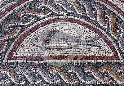 Fish on fragment of Lod Mosaic, famous Roman mosaic floor in Lod town in Israel, displayed in Shelby White and Leon Levy Lod Editorial Stock Photo