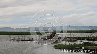 fish hut house in the middle of Limboto Lake, Gorontalo Stock Photo