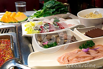 Fish, meat intestine duck blood and others with the shabu pot in Chinese style Stock Photo