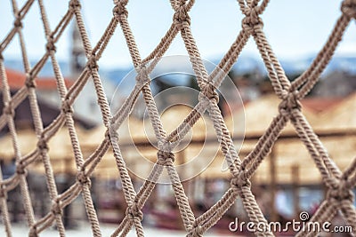 Fish net fence of a beautiful luxurious beach resort Stock Photo