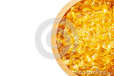 Fish oil, soft capsule, omega, supplement in wood bowl isolated Stock Photo