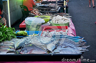 Fish and parrotfish sale for cooking in Sinsuran seafood and street food local night market for malaysian people and foreign Stock Photo