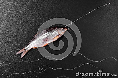 Fish ram on a black surface Stock Photo