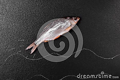 Fish ram on a black surface Stock Photo