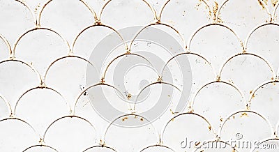 Fish scale pattern on white iron grate Stock Photo
