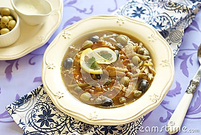 Fish solyanka with capers and olives Stock Photo
